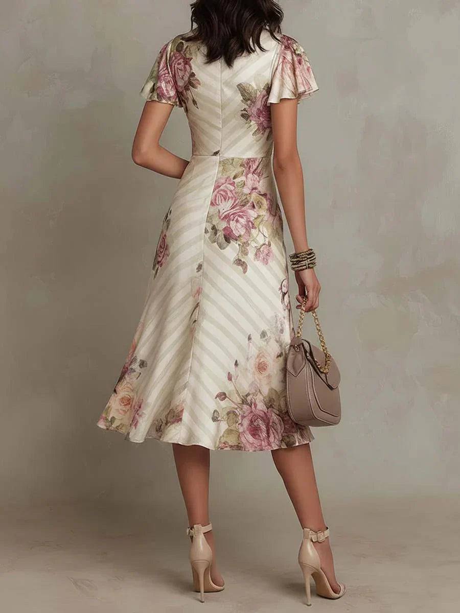 Alba | Elegante vestido midi con drapeado floral