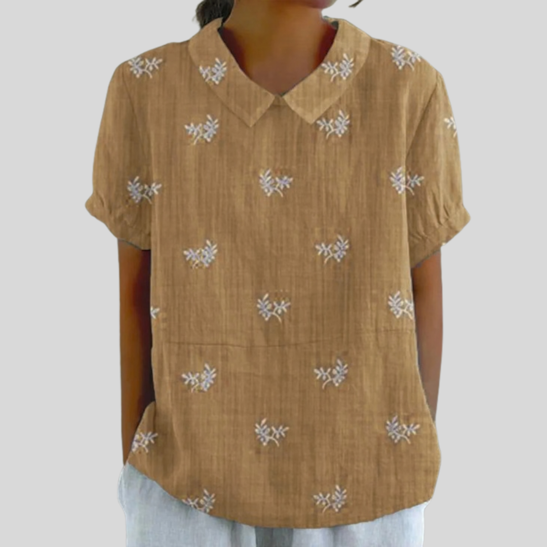 Blusa bordada discreta