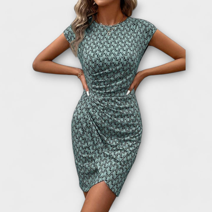 Emma - Vestido de manga corta en corte tulipán con estampado de toda la superficie