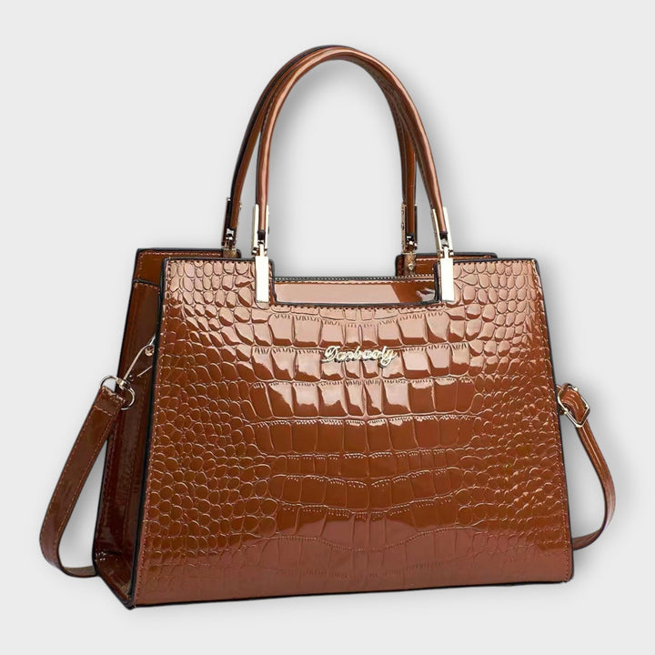Cécile. - Bolso brillante con estampado de cocodrilo