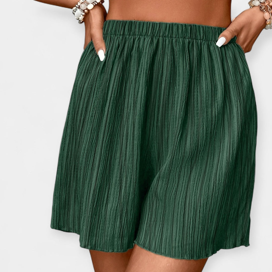 Pantalones cortos elegantes con plisado