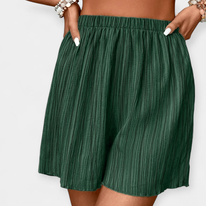 Pantalones cortos elegantes con plisado