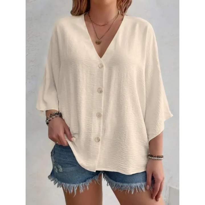 Dorothy™ | Top elegante con cuello en V y botones