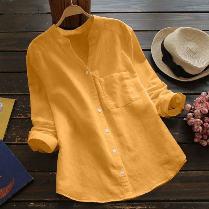 Otoño™ | Blusa unicolor con cuello en V