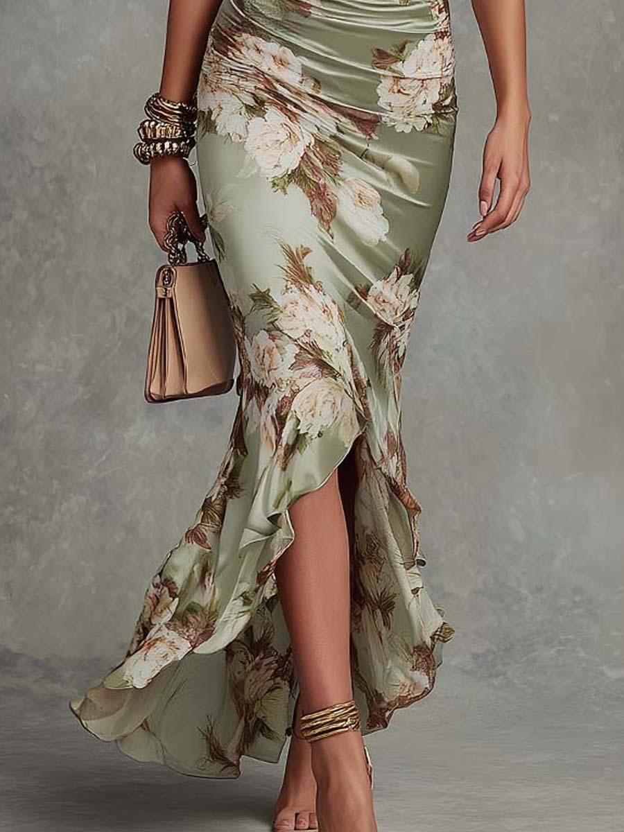 Anna | Vestido largo asimétrico de satén verde con escote en V, mangas abullonadas y estampado floral