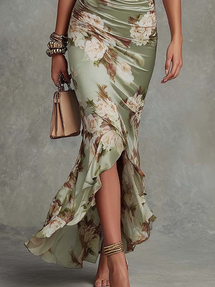 Anna | Vestido largo asimétrico de satén verde con escote en V, mangas abullonadas y estampado floral