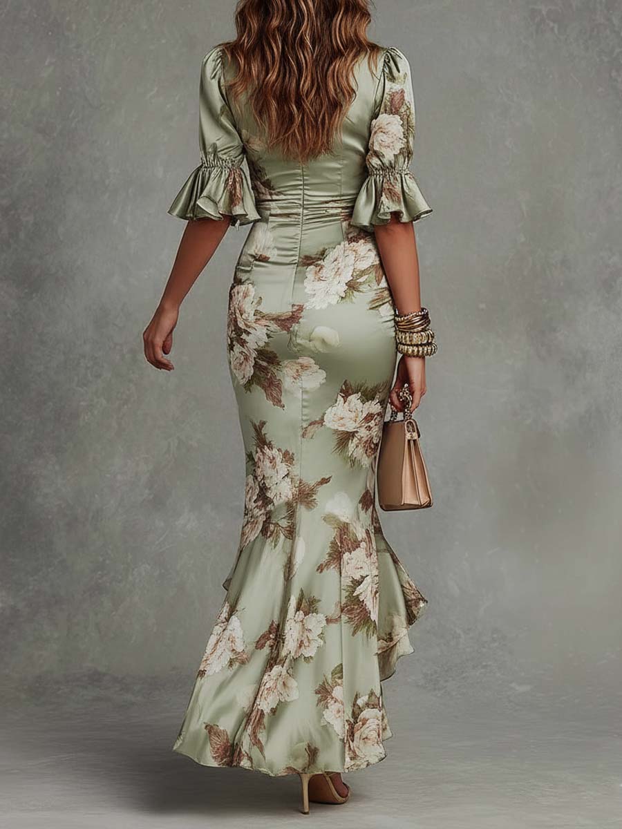 Anna | Vestido largo asimétrico de satén verde con escote en V, mangas abullonadas y estampado floral