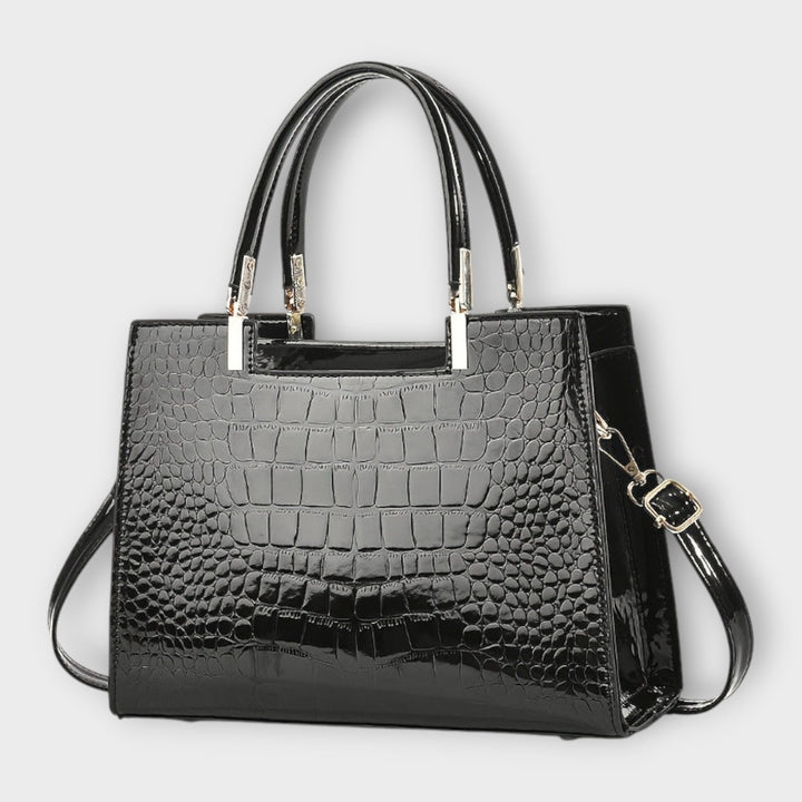 Cécile. - Bolso brillante con estampado de cocodrilo