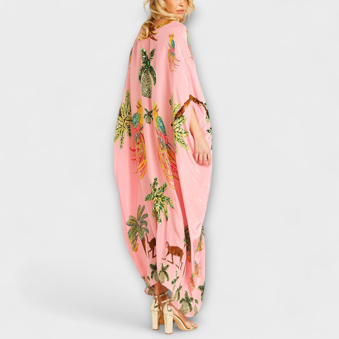 Linda - Impresionante vestido con tirantes asimétricos y estampado de palmeras