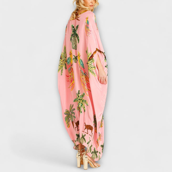 Linda - Impresionante vestido con tirantes asimétricos y estampado de palmeras